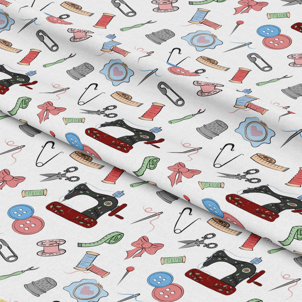 Assorted Sewing Pattern 2 Quilting Cotton Fabric featuring multicolor sewing machine, scissors, buttons, pins, measuring tape, and thread spool illustrations, crafting motif, white background, quilting cotton textile, colorful sewing-themed design, fabric yardage.