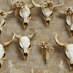 beige, tan, cream, ivory, bull skulls, cow skulls, horns, feathers, flowers, floral accents, western, southwestern, rustic, bohemian, animal skulls,, fabric panel, neutral tones, desert motif, tribal elements, natural textures