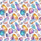 Pattern of colorful, faceted gemstones in various shapes on a white background.