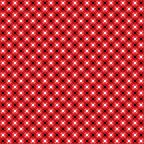 Pattern of small red and black squares with clover-shaped white elements, repeated across the image.
