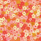 A dense pattern of variously sized pink, red, and yellow flowers on a mottled background.
