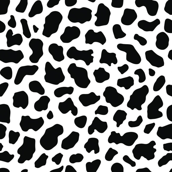 Black and white cow print pattern with irregular spots scattered across the image.