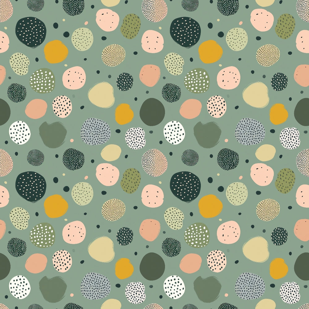 Abstract pattern of variously colored and textured circles on a green background.