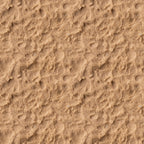 A close-up view of textured sand with small ripples and scattered pebbles.