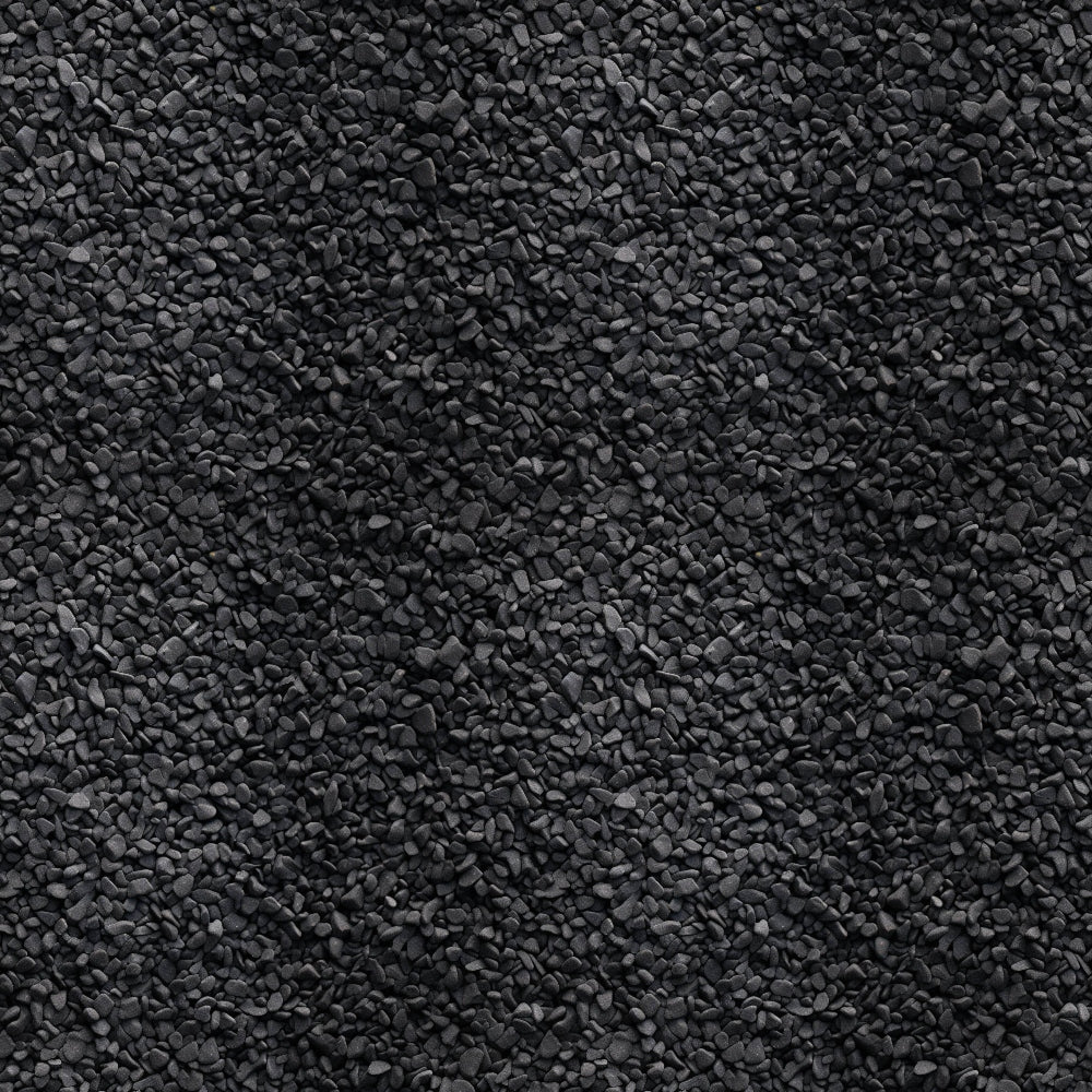 Dark gray gravel stones uniformly spread across the image, creating a textured, rocky surface.