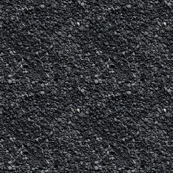 A textured surface of small, uniform dark gray stones closely packed together.