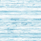 Light blue wooden planks arranged horizontally. The wood texture shows visible grain and knots, with a weathered, rustic appearance.