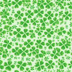 A pattern of various sized green shamrocks on a light green background.
