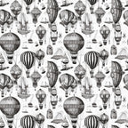 Monochrome illustration of various vintage hot air balloons and airships on a white background.