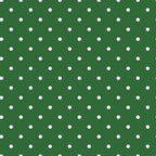 Green background with evenly spaced white polka dots.
