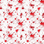 White background with red paint splatters scattered across the surface, creating a random pattern resembling drops and stains.