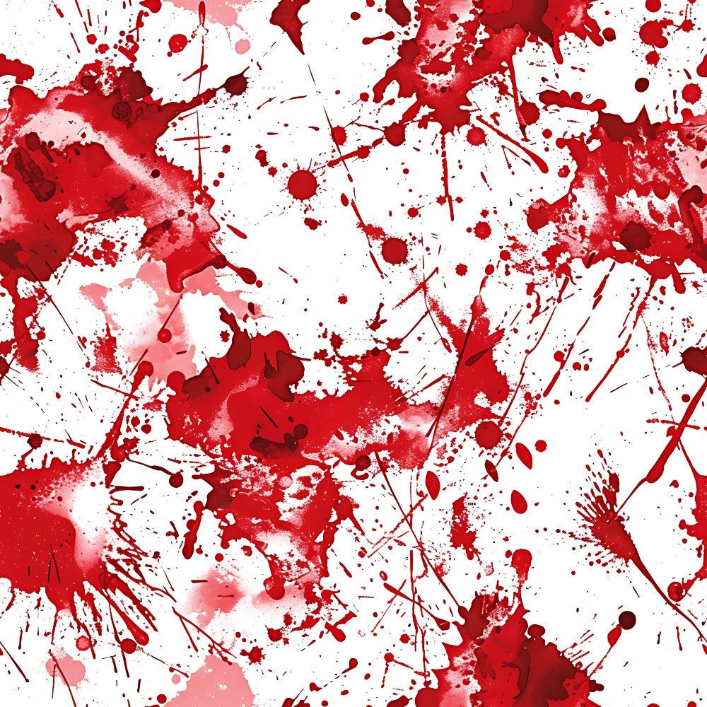 Red paint splatters and drips on a white background, creating an abstract pattern with various shapes and intensities.