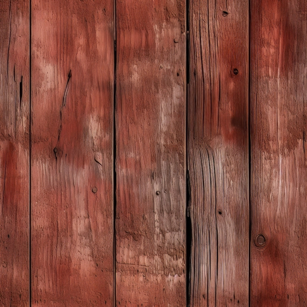 Close-up of weathered, rustic wooden planks with a reddish-brown hue and visible grain patterns.