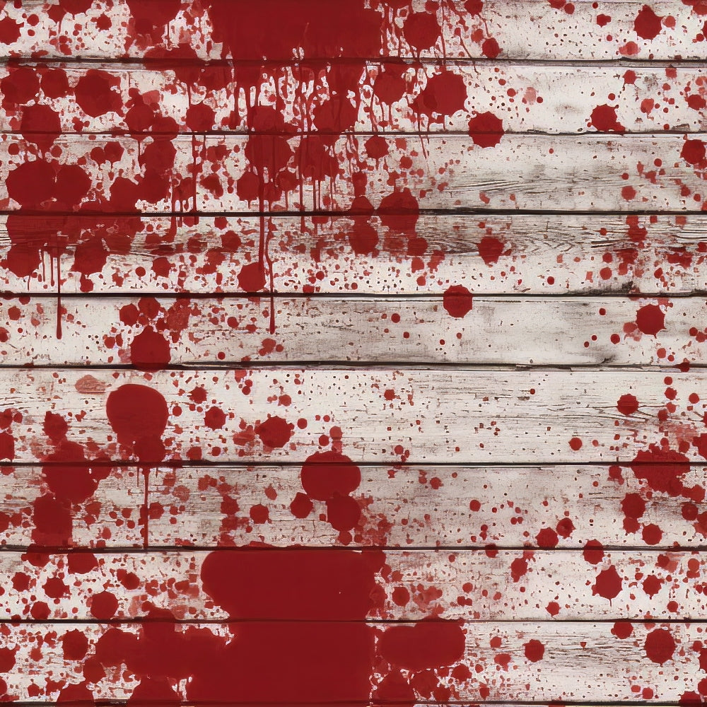Wooden planks splattered with red paint, creating an abstract pattern.