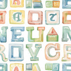 Watercolor illustration of colorful alphabet blocks arranged in a grid. Blocks feature stylized letters A to Z in varying colors and perspectives on a white background.