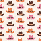 Pattern of brown, orange, and pink cowboy hats with belts on a light background.