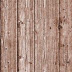 Wooden planks with a rough texture and visible grain pattern, arranged vertically. The wood has a brown, weathered appearance with knots and natural imperfections.