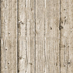 A close-up view of weathered wooden planks with a rough, textured surface, showing vertical lines and knots. The wood has a natural, aged appearance.
