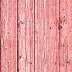 Close-up of a red-stained wooden plank surface showing vertical lines and visible grain texture.