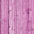 Pink wooden planks arranged vertically, with visible grain and knots.