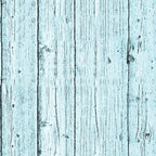 A turquoise wooden plank surface with visible grain and textures.