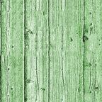 Green wooden planks with vertical grain lines and occasional knots.