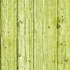 Green-tinted wooden planks aligned vertically, displaying natural texture and grain patterns.