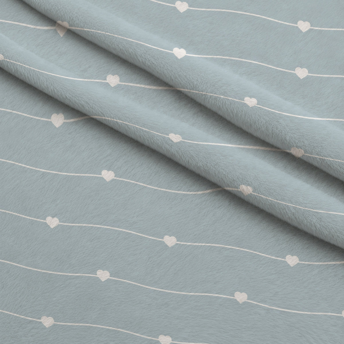 Dusty Blue Hearts Pattern 16 Minky Fabric — plush minky folded close-up preview (mv-minky-v1:lying)