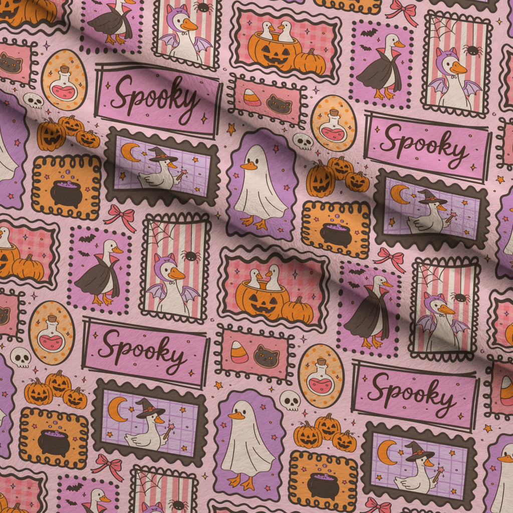 Giggly Ghost Parade Pattern 1 Minky Fabric — plush minky folded close-up preview (mv-minky-v1:lying)