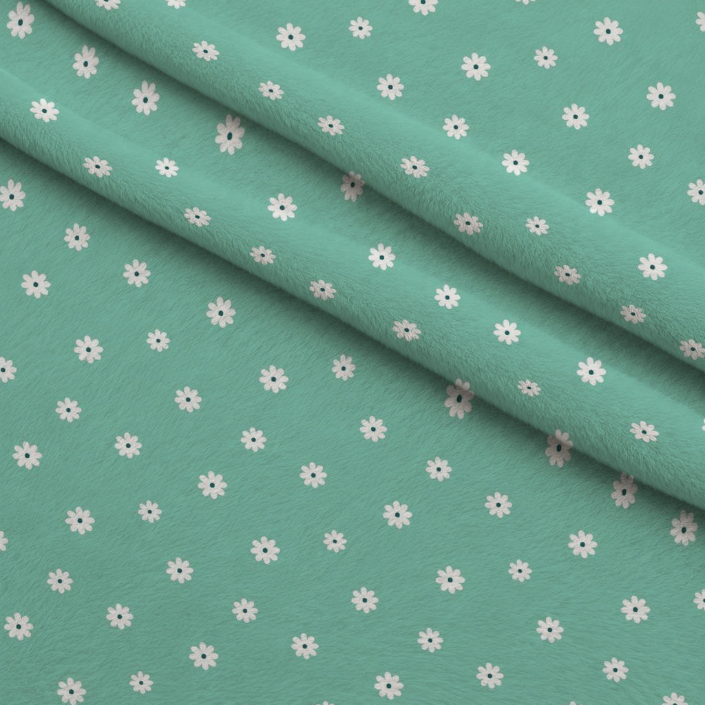 Tiny Daisies on Mint Minky Fabric — plush minky folded close-up preview (mv-minky-v1:lying)