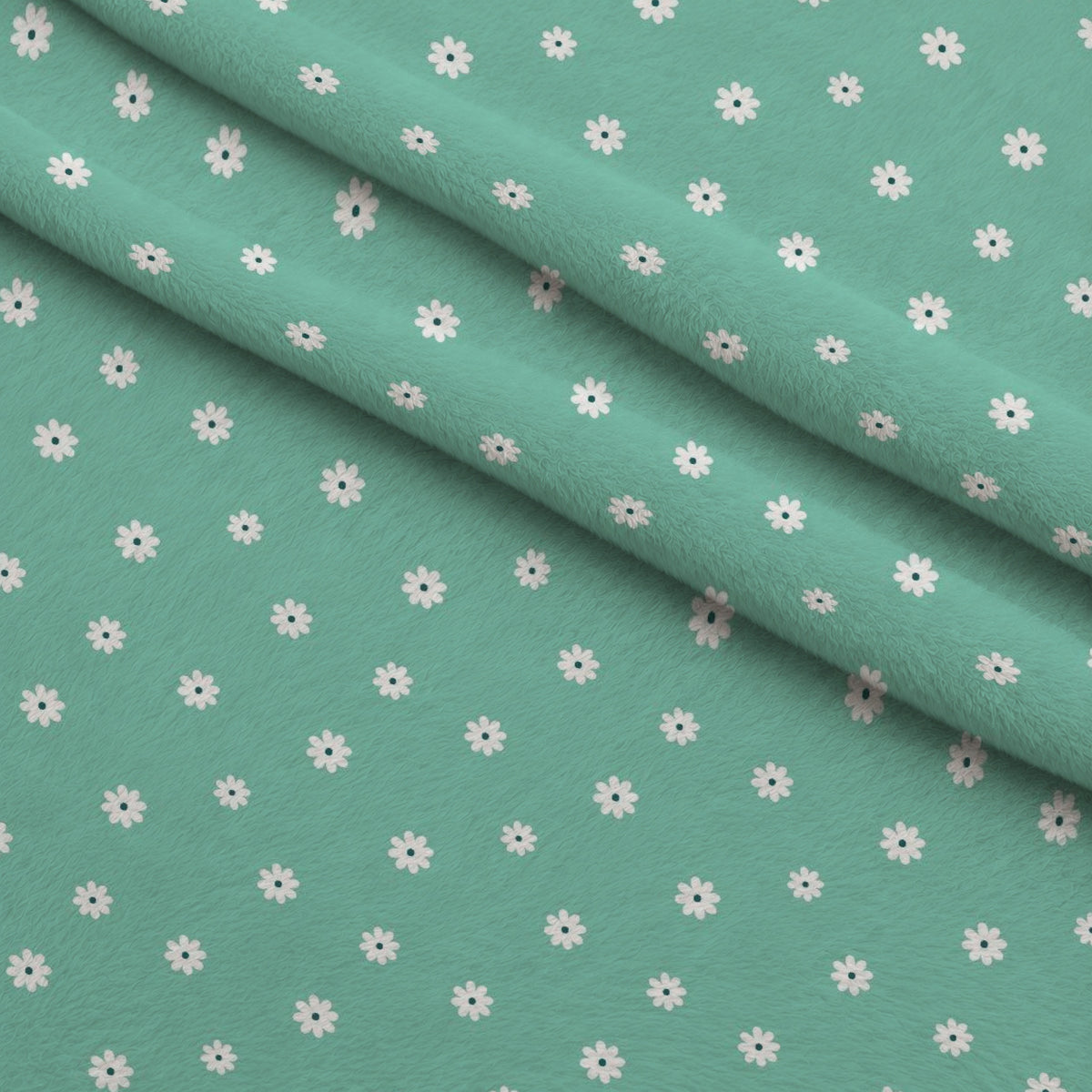 Tiny Daisies on Mint Minky Fabric — plush minky folded close-up preview (mv-minky-v1:lying)